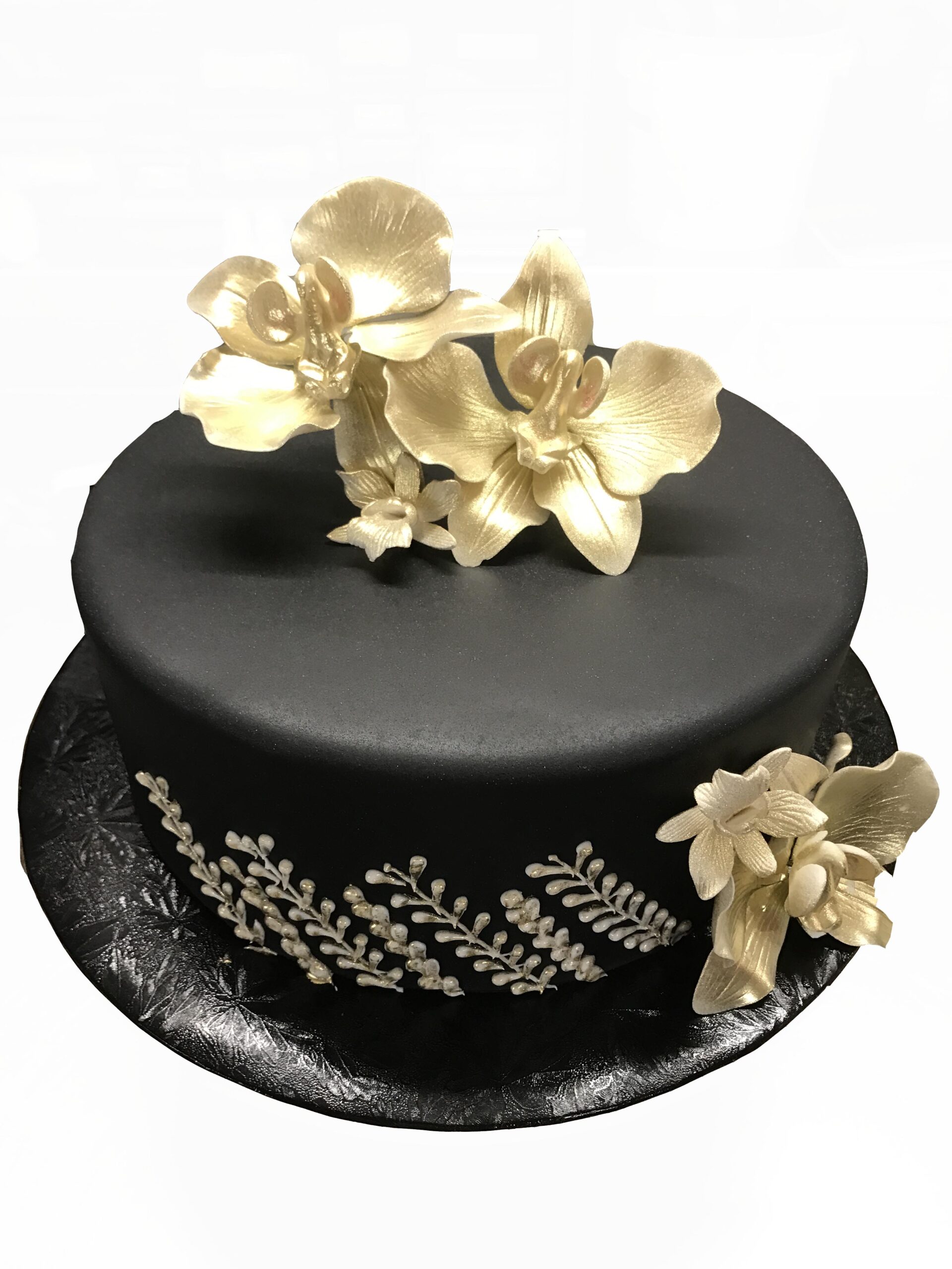 A4. Golden orchids on a black fondant cake