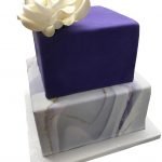 Two tier cake with purple and marble fondant from Copenhagen Bakery in Burlingame California