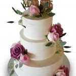 Homespun wedding cake with fresh roses