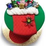 Fondant covered cake with fondant stocking and toys