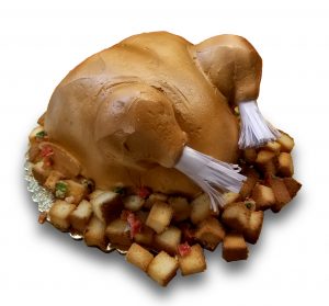 Roasted turkey shaped buttercream cake with toasted cake stuffing