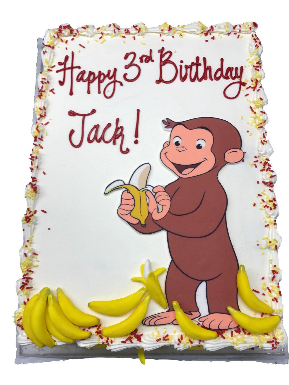 Curious George sheet cake with gumpaste bananas, scanned image and sprinkles