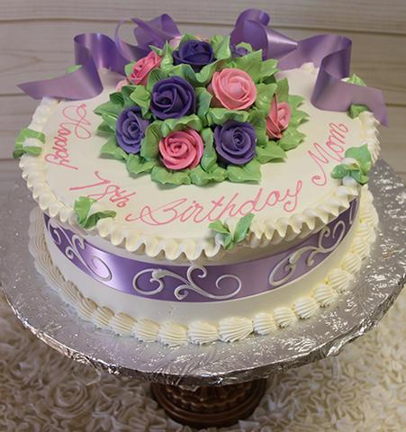 AB009. Purple and pink buttercream rose bouquet with lavender ribbon