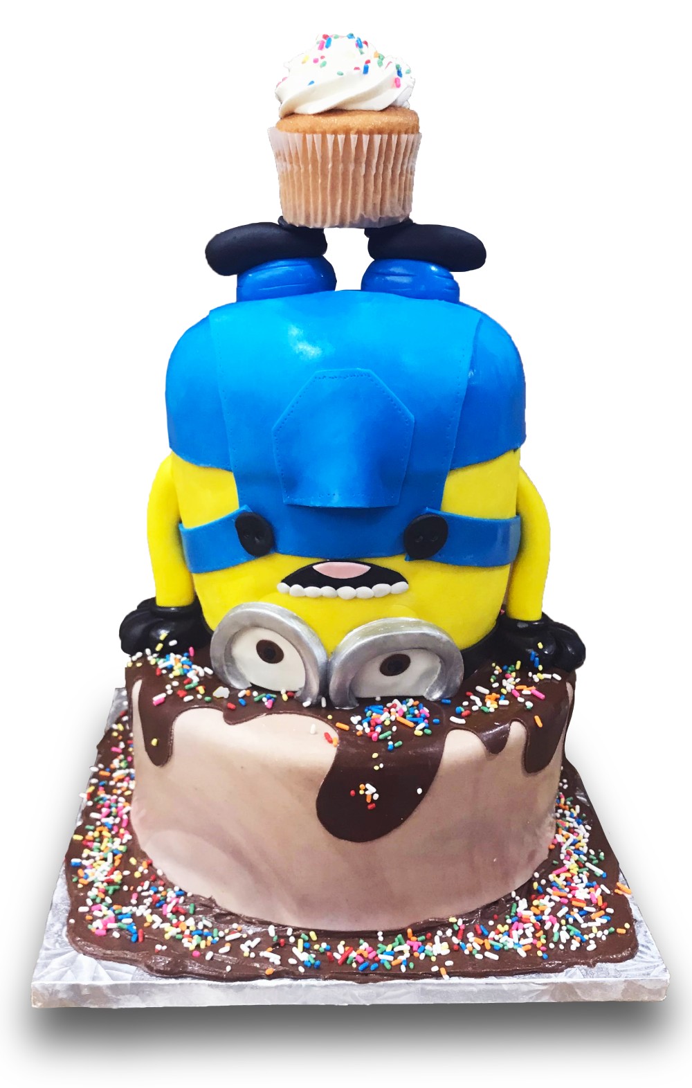 Handstand minion shaped cake covered in fondant