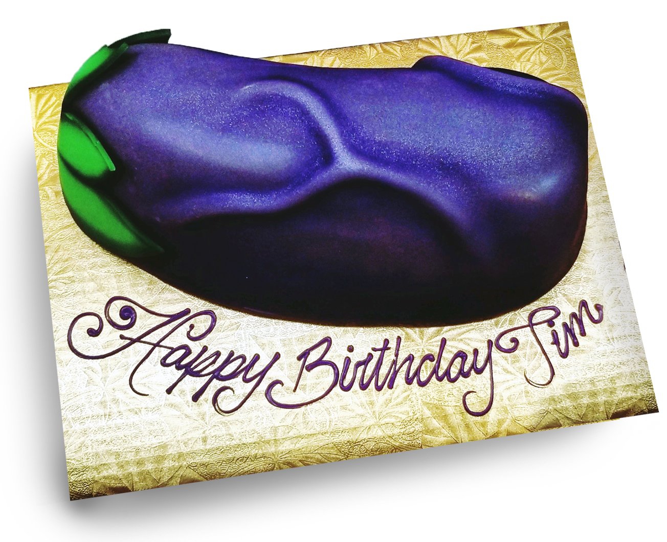 AB030. Fondant covered, eggplant emoji shaped birthday cake