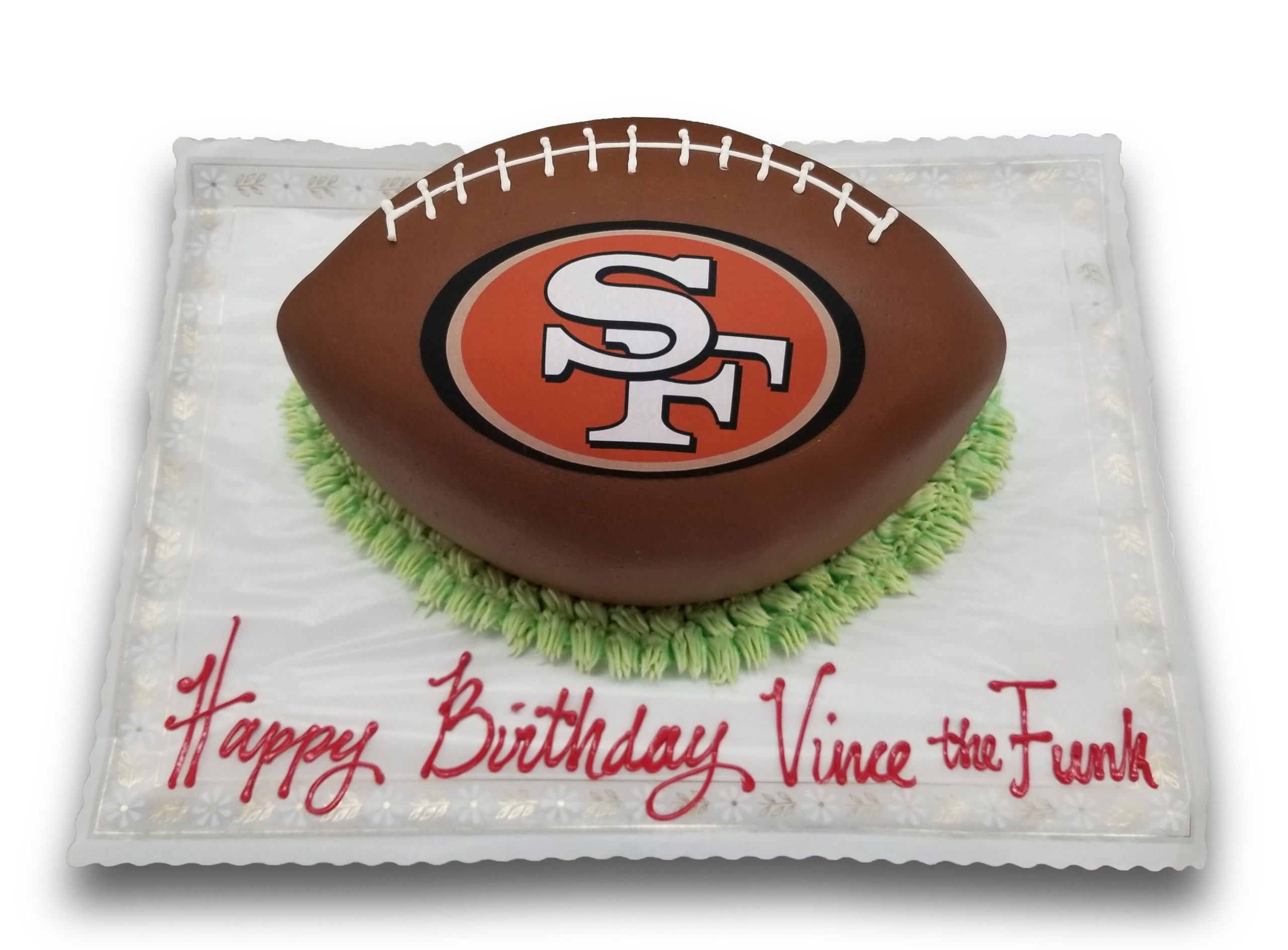Football shaped fondant covered cake with 49ers scan 