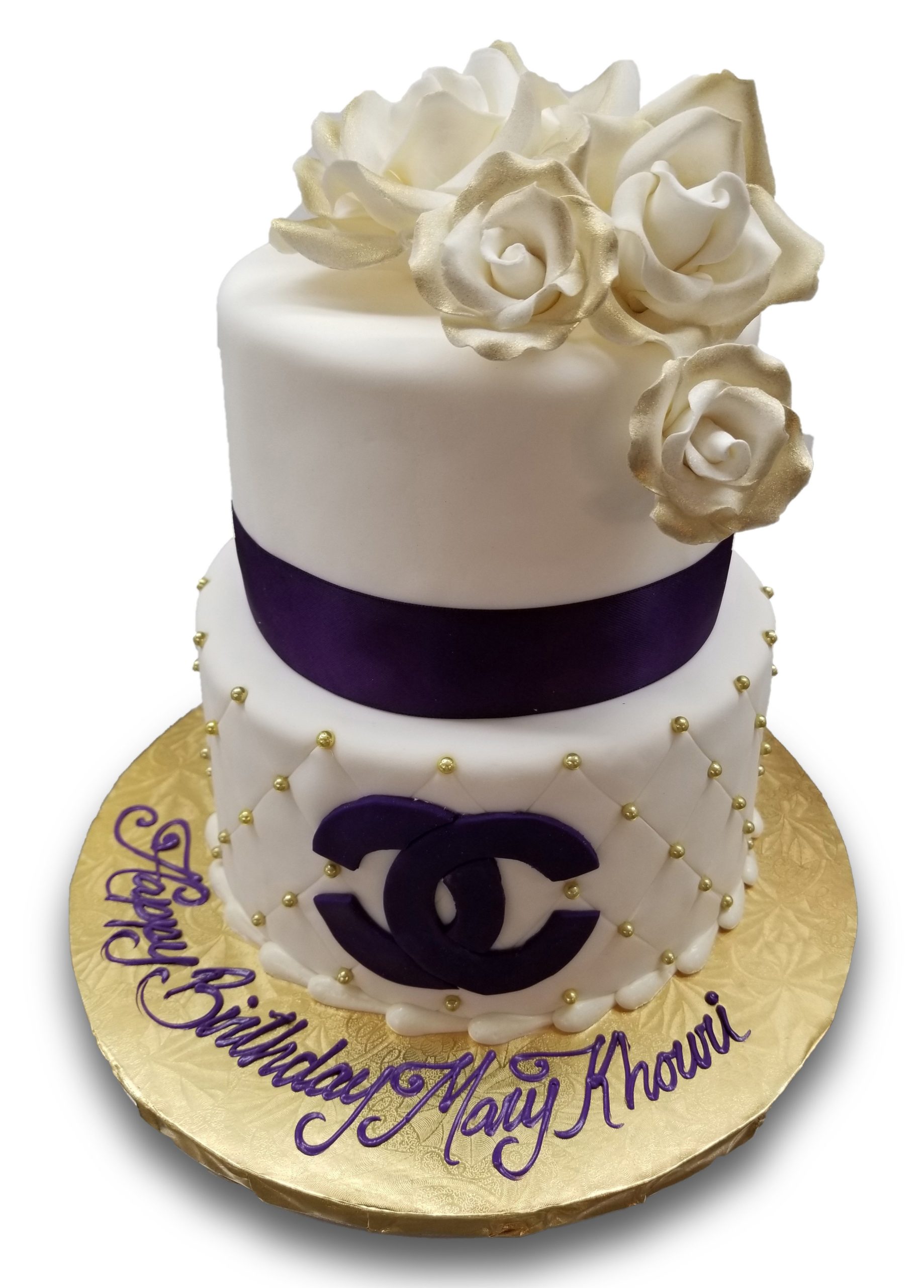 AB015C. Two tiered quilted Chanel birthday cake with violet ribbon and logo and gumpaste roses