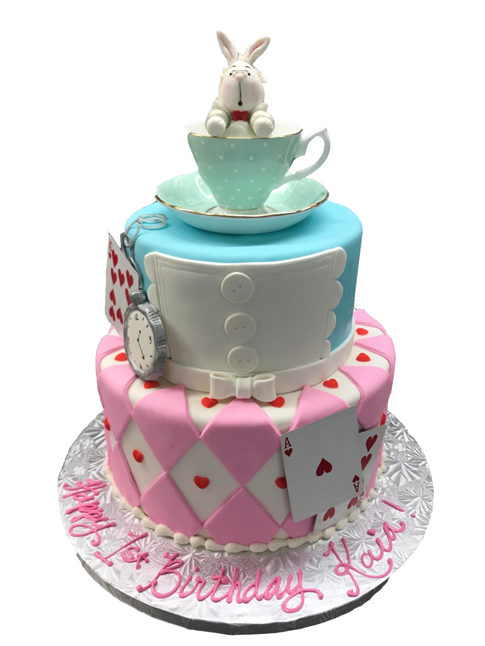 Alice in Wonderland cake decorated with fondant and fine china cup.