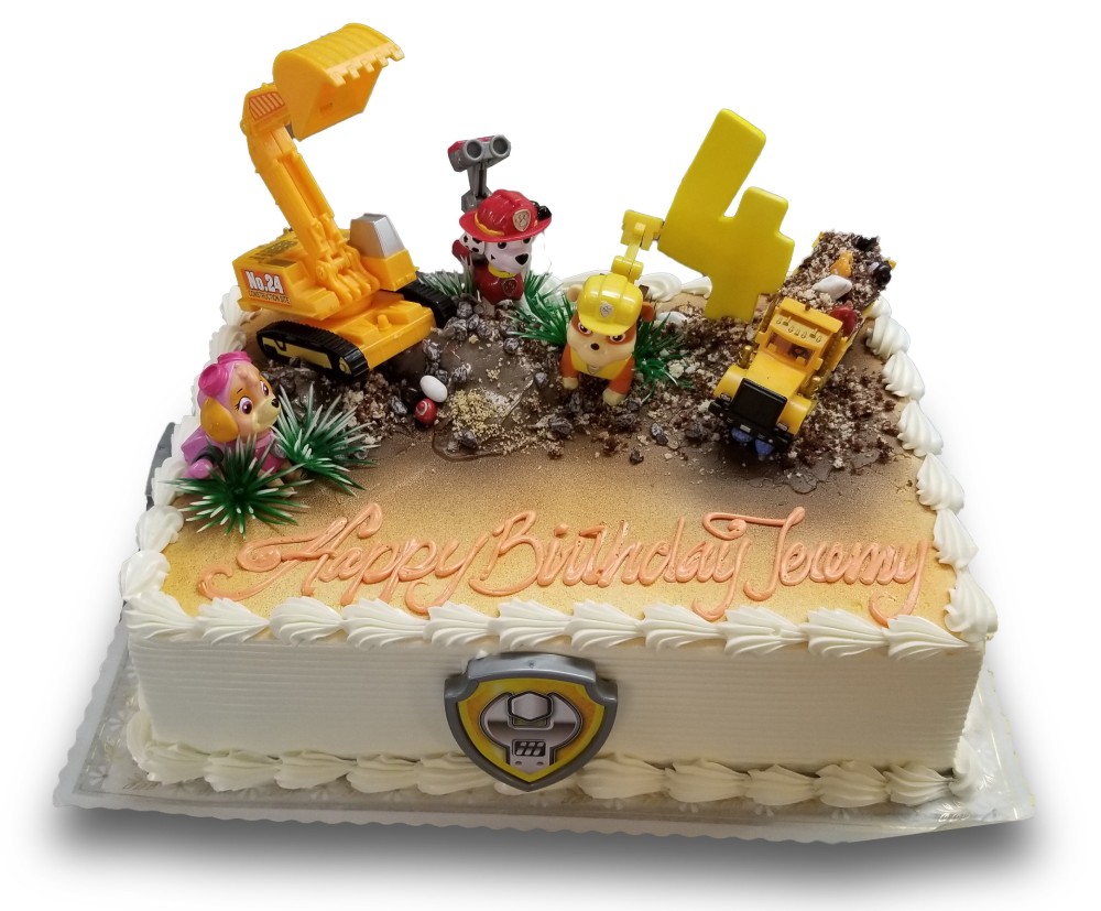 Construction themed 4th birthday cake with Paw Patrol toys 