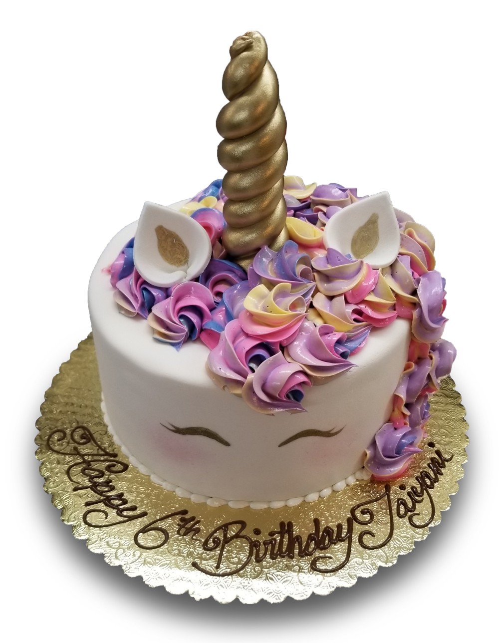 Fondant covered unicorn cake
