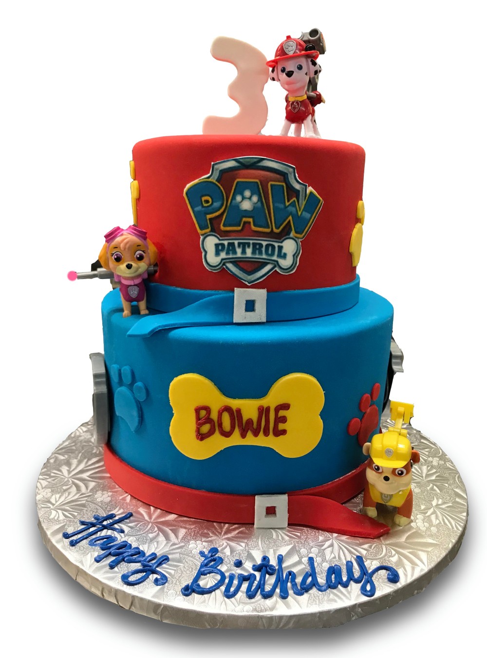 Two tiered fondant covered paw patrol theme cake
