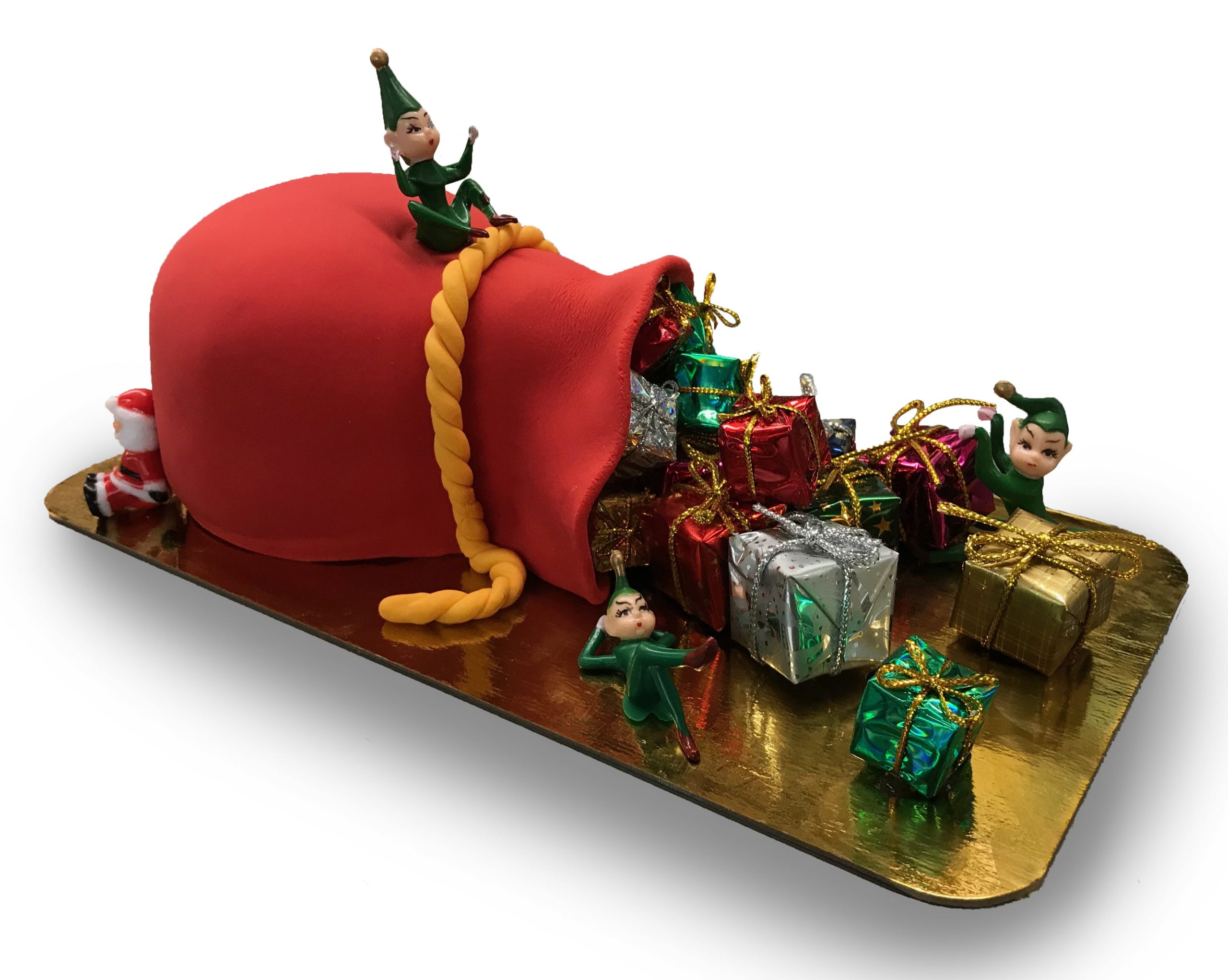 Fondant covered santa's sack shaped cake with toy presents and elves